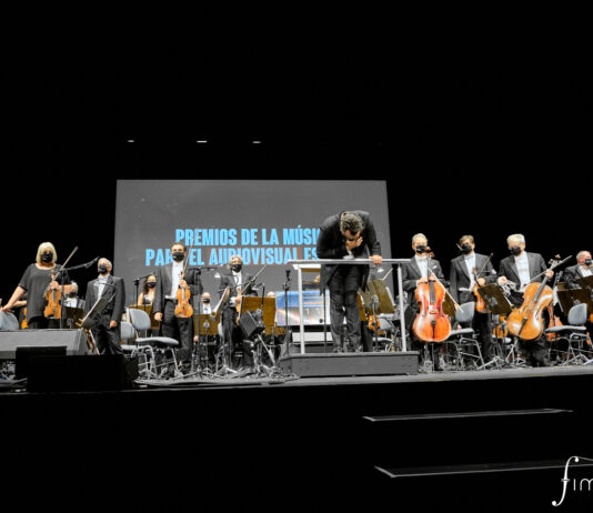 Musimagen y FIMUCITÉ anuncian los ganadores de los V Premios de la Música para el Audiovisual Español Segundo concierto "Somos La Resistencia: La Casa de Papel en Concierto". Diego Navarro, director y compositor. Orquesta Sinfonica de Tenerife. Cecilia Krull, voz solista. Fran León, voz solista. Gonzalo de Araoz, Guitarras y mandolina. Daniel Lukacks, bajo eléctrico. David González, teclado. Siddharta Dorta, batería. Con la participación especial de Manel Santisteban, piano y Pedro Alonso, voz. Auditorio de Tenerife © Aarón S. Ramos/Fimucité